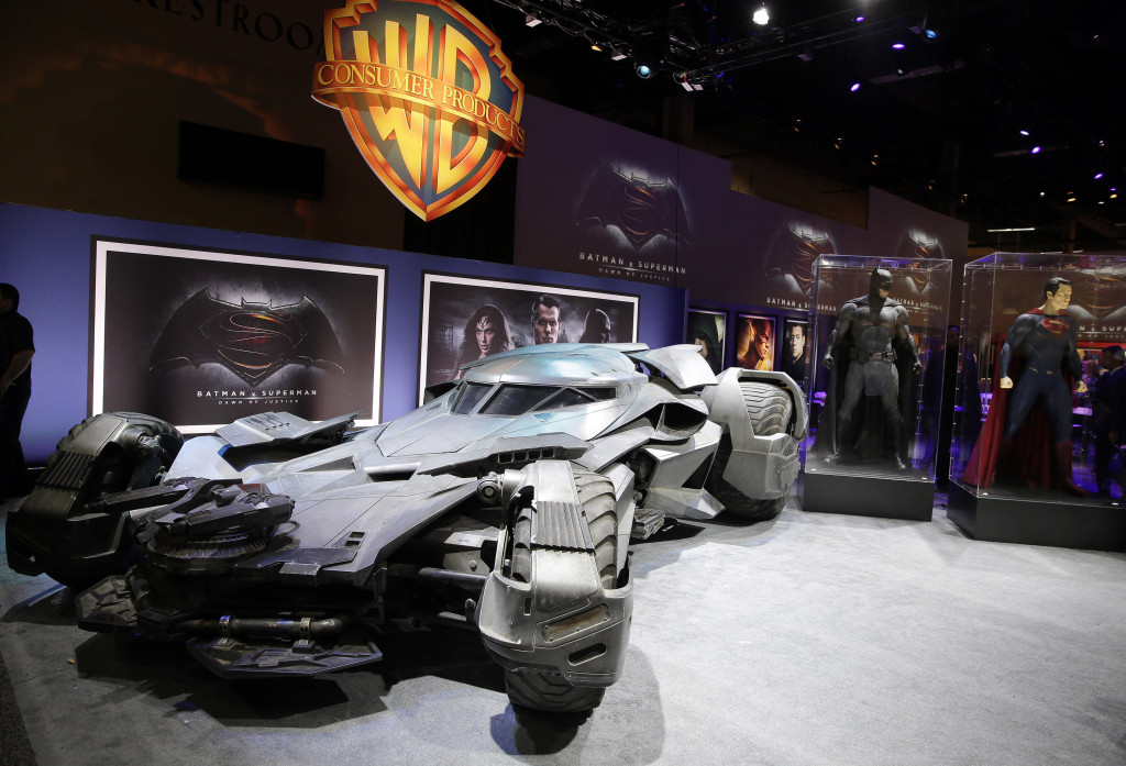 Warner Bros. Consumer Products exclusively unveils the Batmobile and select costumes from the highly anticipated film, “Batman v Superman: Dawn of Justice” at Licensing Expo 2015 on Tuesday, June 9, 2015 in Las Vegas. (Photo by Isaac Brekken/Invision for Warner Bros./AP Images)